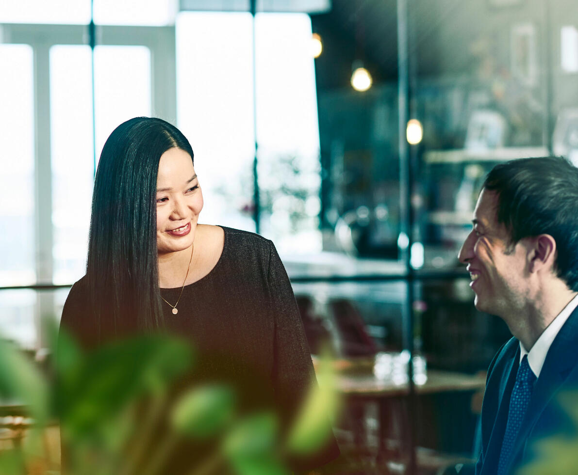 Two people in conversation